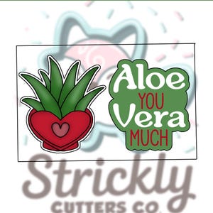 May include: Two cookie cutters: one of a green aloe plant in a red heart-shaped pot, and another with the text "Aloe You Vera Much" in white on a green background. The brand name "Strickly Cutters Co." is at the bottom.