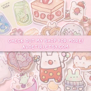 May include: A collection of colorful stickers featuring cartoon bunnies, desserts, and other cute designs. The stickers are on a pink background with the text 'CHECK OUT MY SHOP FOR MORE! ALOETIRI'.
