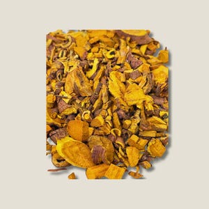 May include: A collection of dried, chopped botanical pieces featuring a vibrant yellow interior and a dark brown, textured outer bark. The irregular fragments vary in size and shape, displaying a mix of bright golden-yellow and deep brown tones.