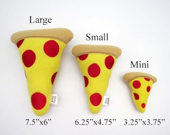 May include: Three plush pizza slice dog toys in different sizes: large, small, and mini. The toys are yellow with red pepperoni and the text "Dog Toy" on the side. The large toy measures 7.5 inches by 6 inches, the small toy measures 6.25 inches by 4.75 inches, and the mini toy measures 3.25 inches by 3.75 inches.