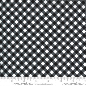 May include: Black and white gingham fabric with a diagonal pattern. The fabric is measured in inches.