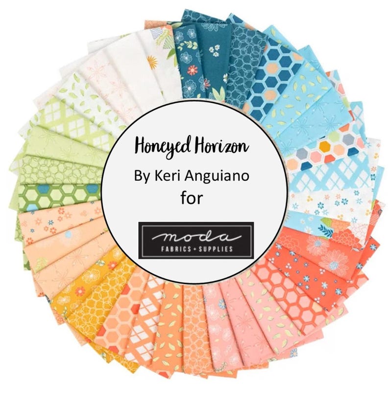 May include: A circular fabric bundle featuring the Honeyed Horizon collection by Keri Anguiano for Moda Fabrics. The fabric swatches display a variety of patterns including hexagons, floral motifs, and geometric shapes in shades of blue, orange, yellow, and white.