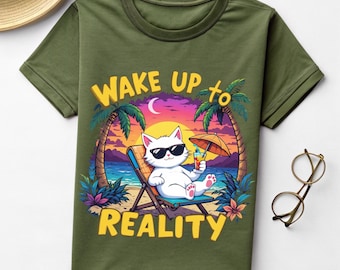 May include: Khaki green t-shirt with a cartoon cat wearing sunglasses, relaxing on a beach chair with a drink. The shirt has the text "WAKE UP to REALITY" in yellow, with a tropical sunset background.