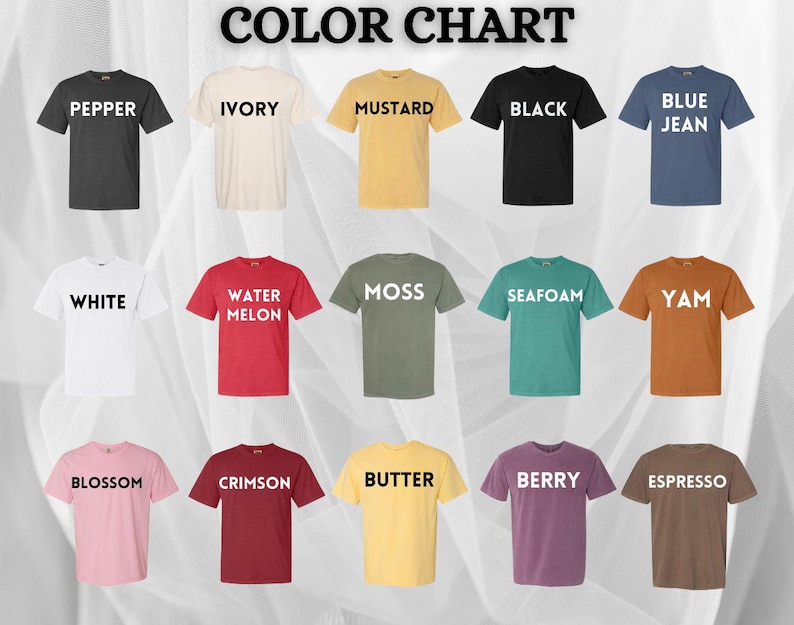 May include: A colour chart showing t-shirts in a range of hues: pepper, ivory, mustard, black, and blue jean. Other colours include white, watermelon, moss, seafoam, and yam. The chart also shows blossom, crimson, butter, berry, and espresso.
