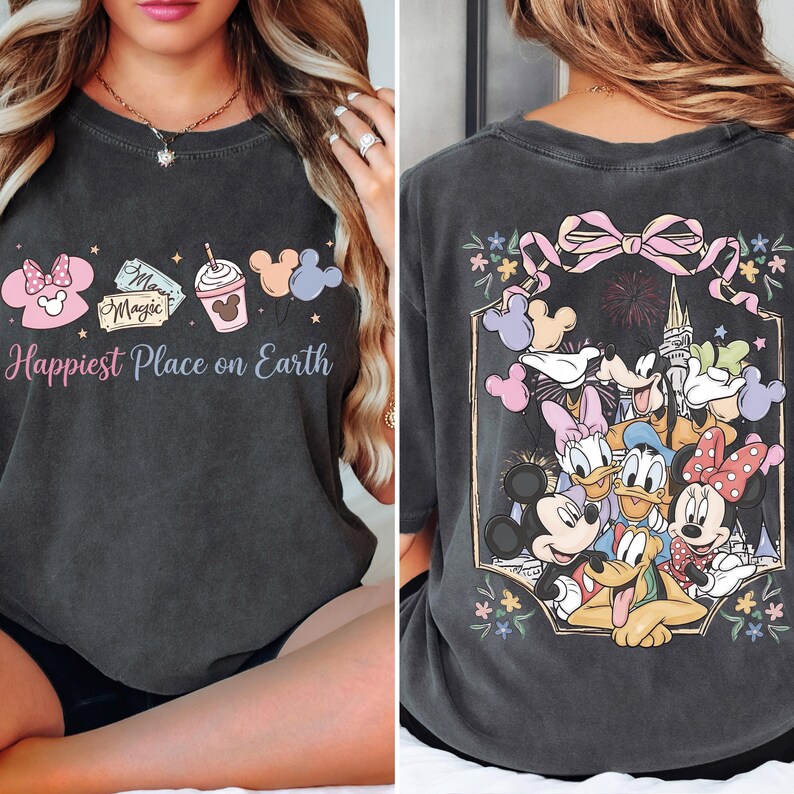 The image is a collage of two photos. The left photo shows a woman wearing a black t-shirt with a graphic design featuring Disney characters and the text "Happiest Place on Earth". The right photo shows the back of the same t-shirt, featuring a design of Disney characters and the text "Happiest Place on Earth".
