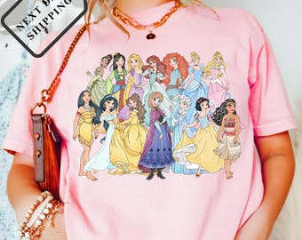 Camiseta de princesas Disney Comfort Color® con lazos de acuarela, Disney Aurora, Ariel, Bella, Cenicienta, viaje de chicas a Disneyland 2026 0072