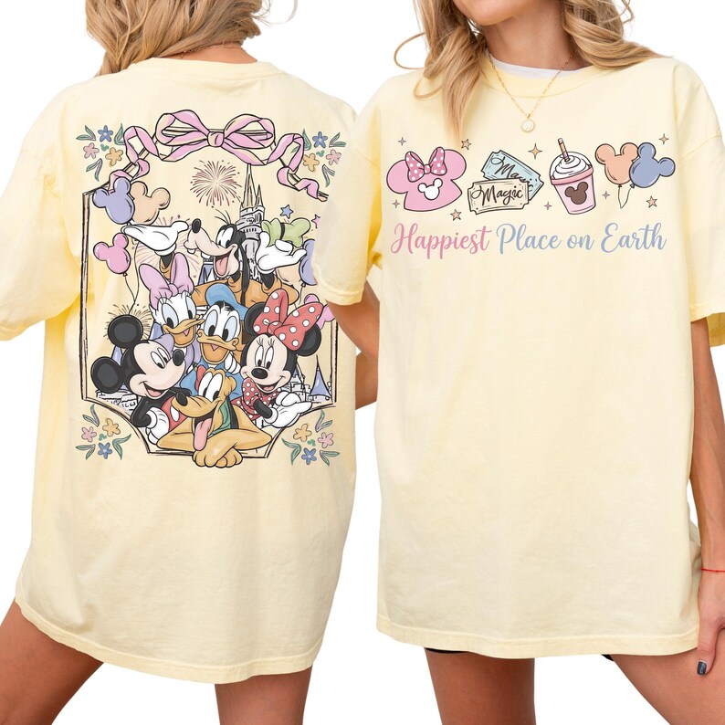 two yellow t-shirts with Disney characters on them.