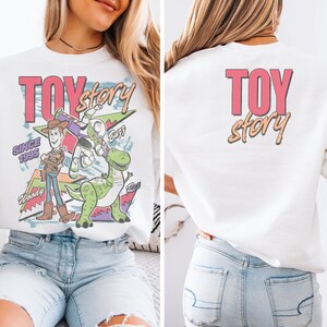 The image is a collage of two photos featuring a woman wearing a white T-shirt with a colorful graphic of Woody and Buzz from Toy Story.
