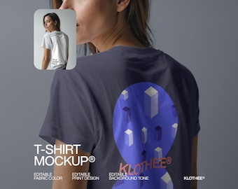 May include: A navy blue t-shirt mockup with a blue and white geometric design on the back. The shirt features the text "T-SHIRT MOCKUP®" and "KLOTHEE®". The image also shows a smaller image of a white t-shirt with the text "Your Design Here".