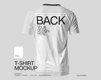 May include: White t-shirt mockup with the word "BACK" in large black letters on the back. Below it, the text reads "YOUR DESIGN HERE." The shirt has a black collar and the words "T-SHIRT MOCKUP" are at the bottom.