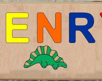 Custom Long Board Name Dinosaur Theme Puzzle.  An educational name puzzle toy for preschool toddler children to learn their name and colors.