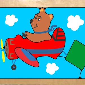 Tema de avião longo de quebra-cabeça com nome personalizado. Um brinquedo educativo para crianças em idade pré-escolar aprenderem seus nomes, cores e formas.