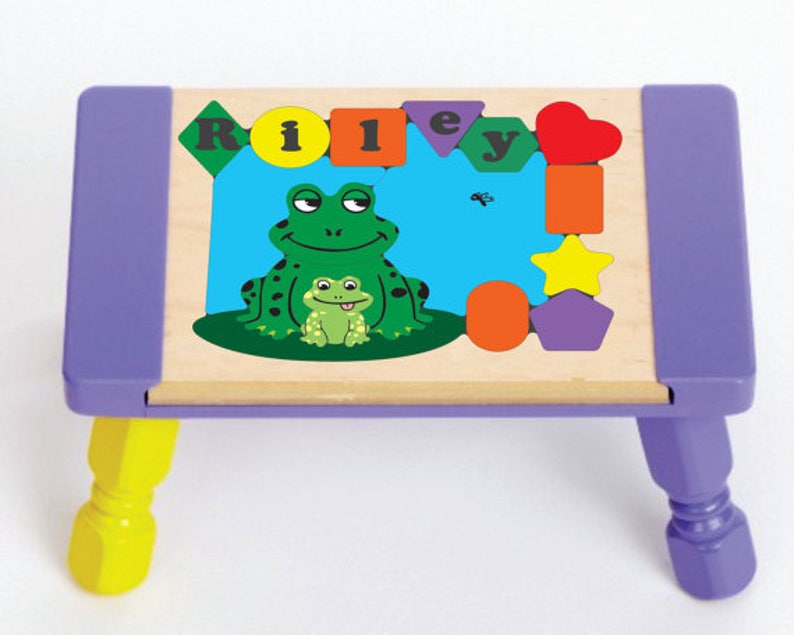 Personalized Name Puzzle Stool Frog Theme colors and name. An educational toy that your children will leap into learning their shapes