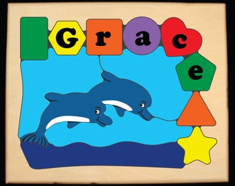 Personalized Name Puzzle Dolphin Fish Sea World Theme. Kids learning shapes, colors & name is educational for preschool toddler children.