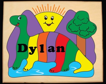 Personalized Name Puzzle Dinosaur Sun Theme.  An educational puzzle for preschool toddler children learning their name, colors and shapes.