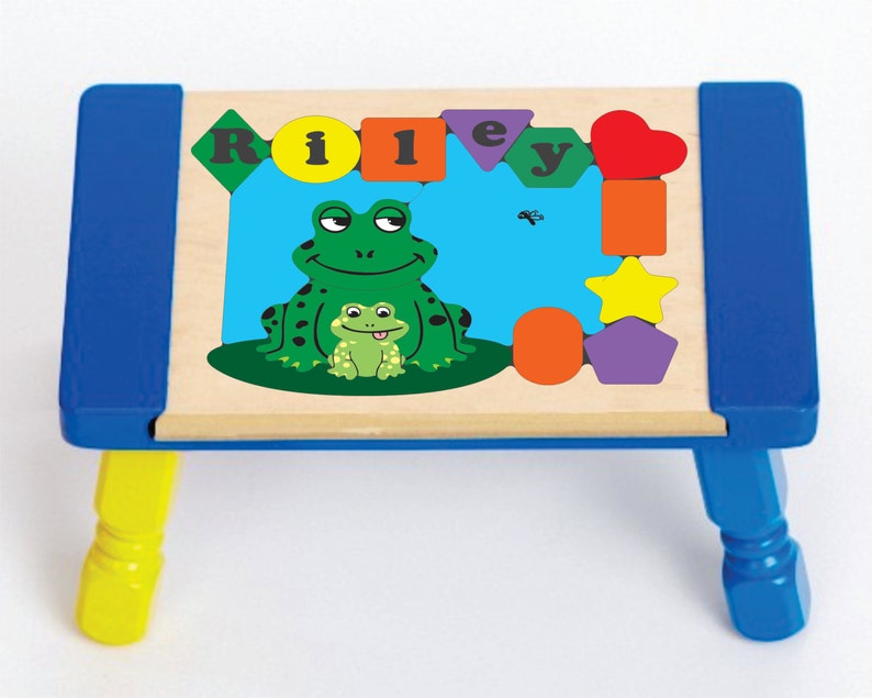 Personalized Name Puzzle Stool Frog Theme colors and name. An educational toy that your children will leap into learning their shapes