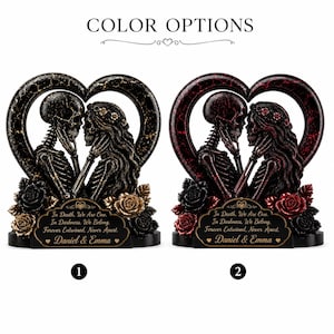 May include: Two heart-shaped skeleton figurines with roses and a plaque reading: In Death, We Are One. In Darkness, We Belong. Forever Entwined, Never Apart. Daniel & Emma. Option 1 features black and gold accents, while option 2 features black and red.