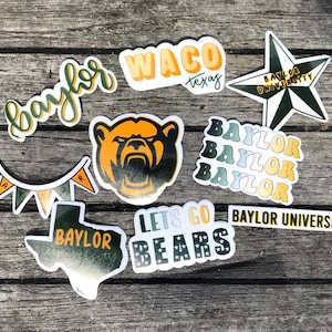 May include: A collection of Baylor University stickers featuring a bear, a star, a banner, and the words "Waco, Texas", "Baylor", "Let's Go Bears", and "Baylor University".