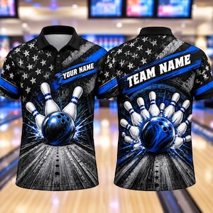 May include: A black polo shirt featuring a graphic of a blue bowling ball and white pins on a wooden lane. The design includes a blue stripe, a star pattern, and the text "YOUR NAME" and "TEAM NAME" printed across the front and back panels.