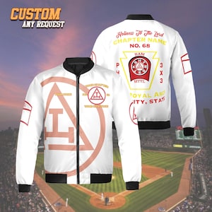 May include: White bomber jacket with black trim, featuring custom text and graphics. The jacket has a large geometric design in a peach color, with text that reads "CUSTOM ANY REQUEST" and "Holiness To The Lord".