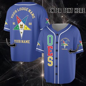 May include: Blue baseball jersey with white trim, featuring a star emblem and the text "YOUR LODGE NAME" and "YOUR NAME". The front displays "OES" vertically. The jersey has buttons and short sleeves.