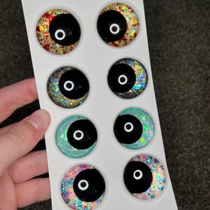 the galaxy collection | glitter galaxy | crochet amigurumi sinker eyes