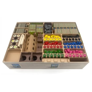 May include: A beige board game organiser filled with various game components. It includes stacks of cards, wooden figures in multiple colours, and other game pieces. The organiser is designed to hold the game's contents neatly.