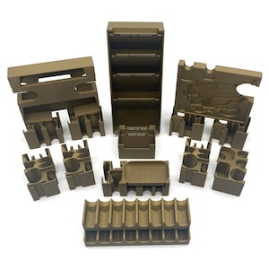 May include: A set of 10 brown plastic storage containers for organizing board game pieces. The containers are labeled with the text "Tides of War", "Iron Bank", "Play for Coins", "Dance with Weapons", "Mission - Standards", and "The Map".