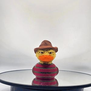 Freddy Krueger Horror-Inspired Collectible for Thrill Seekers Nightmare Hunter Duck