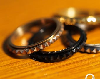 Spike spinnerring dames – draaibare band met studs, roestvrijstalen fidgetring, goud zilver zwart edgy sieraden
