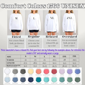 May include: White Comfort Colors unisex sweatshirts in sizes M, L, XL, and 2XL are displayed. The image includes a size chart with measurements in inches and a color palette. The text advises sizing for a relaxed fit.