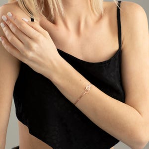 Double Venus pride bracelet symbolizing LGBT love, shown as a meaningful Valentine’s Day gift