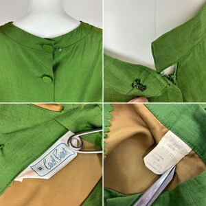 May include: Green sleeveless dress with a round neckline and button closure. The dress has a label that reads "Carol Brent" and a tag that says "D. Jones Green Size 12".