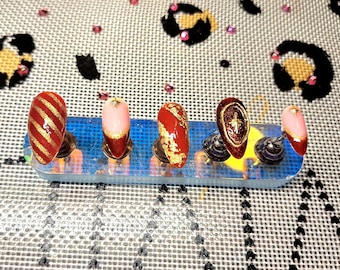 Red and gold wizard nails!