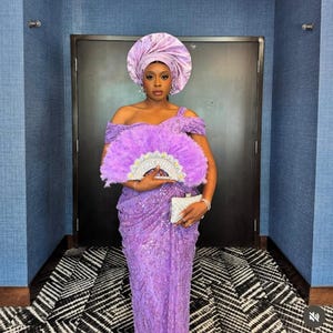 Purple Lace Asoebi Dress with Gele & Matching Fan – Handmade Nigerian Wedding Guest Outfit – Luxury African Formal Wear
