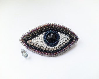 Eye brooch, pin, beaded, tear, iris, pupil, jewelry