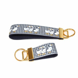 vintage duck on navy gingham keychain gold hardware in wristlet and mini size