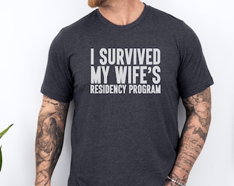 I Survived My Wife's Residency Program T-Shirt, Funny Medical School Gift Tee, Humorous Doctor Spouse Shirt, Graduation Present