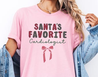 Santa's Favorite Cardiologist T-Shirt, Christmas Heart Doctor Shirt, Plaid Holiday Cardiology Top, Coquette Bow Medical Doctor Gift