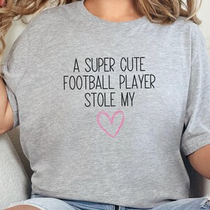 Cute Football Player Shirt, A Super Cute Football Player Stole My Heart, Funny Football T-Shirt, Football Sports Tee