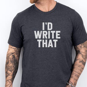「I'd Write That」Tシャツ、面白いライティングTシャツ、作家の名言Tシャツ、モチベーションを高めるライティングTシャツ、作家へのギフト、ライティング愛好家Tシャツ