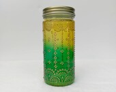 Hand Stained-Painted glass jar-red green fading to yellow (hombre) with intricate gold 39 henna style 39 designs.