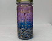 Hand Stained-Painted glass jar-red purple fading to blue(hombre) with intricate gold 39 henna style 39 designs.