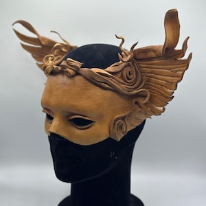 Brown leather mask - Winged being made of natural brown leather. Masquerade mask leather. Halloween mask.