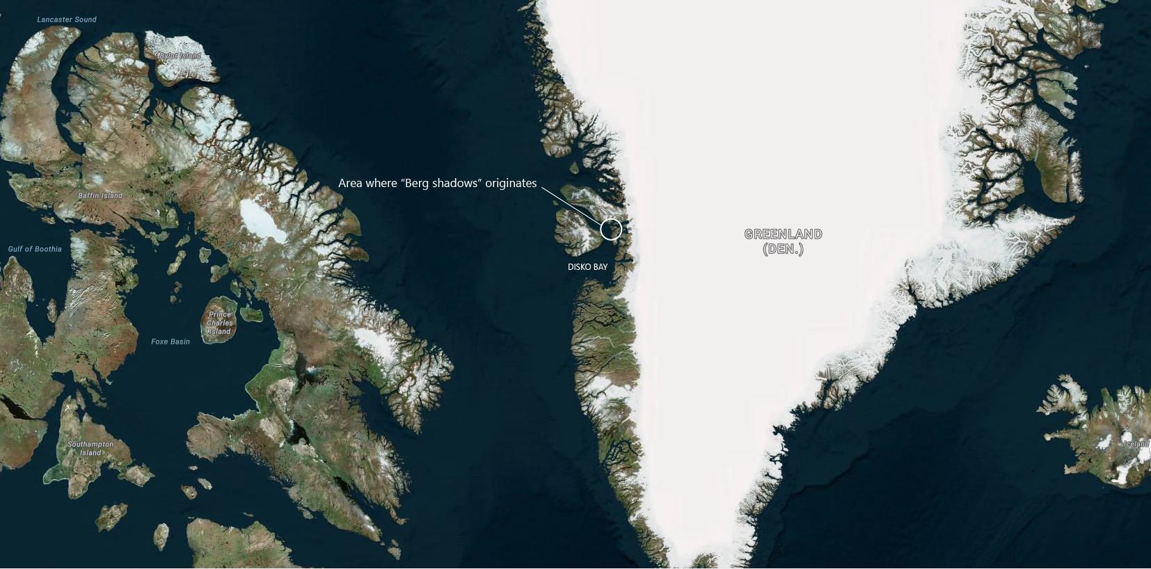 Greenland Hunter Kayaking in the Shadow of Huge Icebergs in Aqua ...