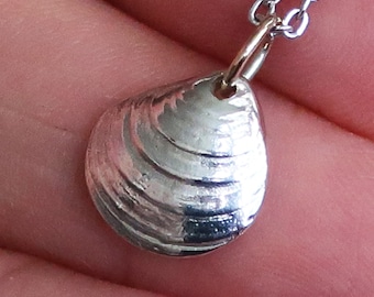 Small Robert Moses, Long Island Solid Sterling Silver Clam Shell Charm Necklace with Yellow Gold jump ring.