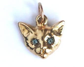 Gold Tone Cat Charm Brass with Aquamarine Eyes