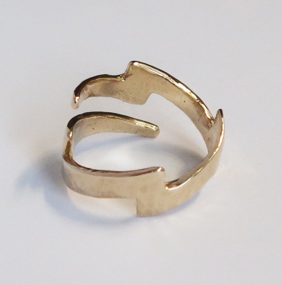 Gold Lightning Bolt Ring with tapered ends.