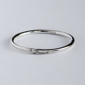 Thin Sterling Silver, Sewing Needle, continuous closed circle, stacking ring.