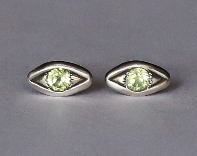 Featured listing image: Sterling Silver with Pale Green Peridot Evil Eye Stud Earrings